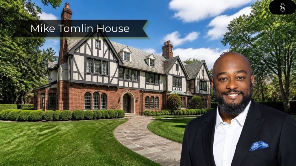 Tudor Revival mansion with half-timbered facade, brick chimneys and manicured lawn in a Pittsburgh-style neighborhood